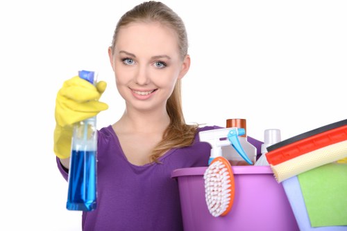 Local oven cleaner working in a modern Elephant and Castle flat